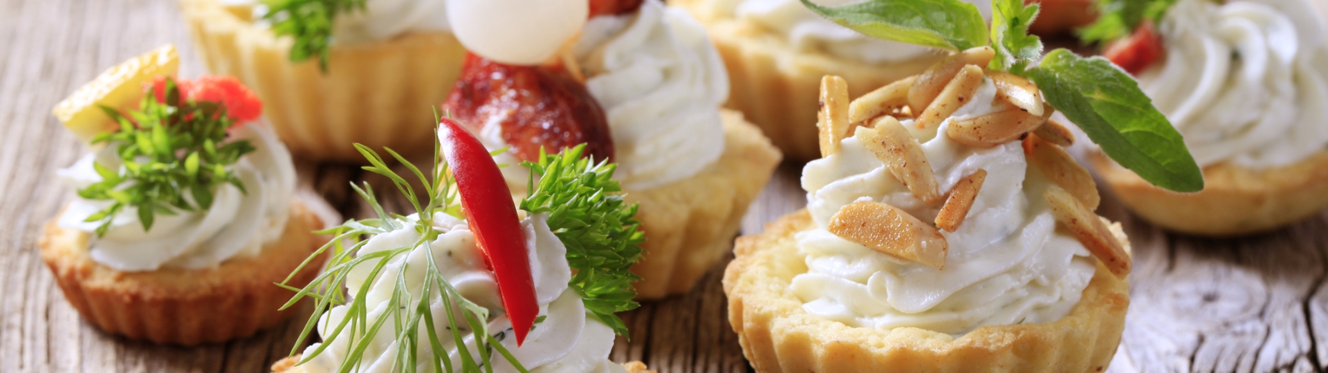 Variety of pastry-based canapes with various toppings